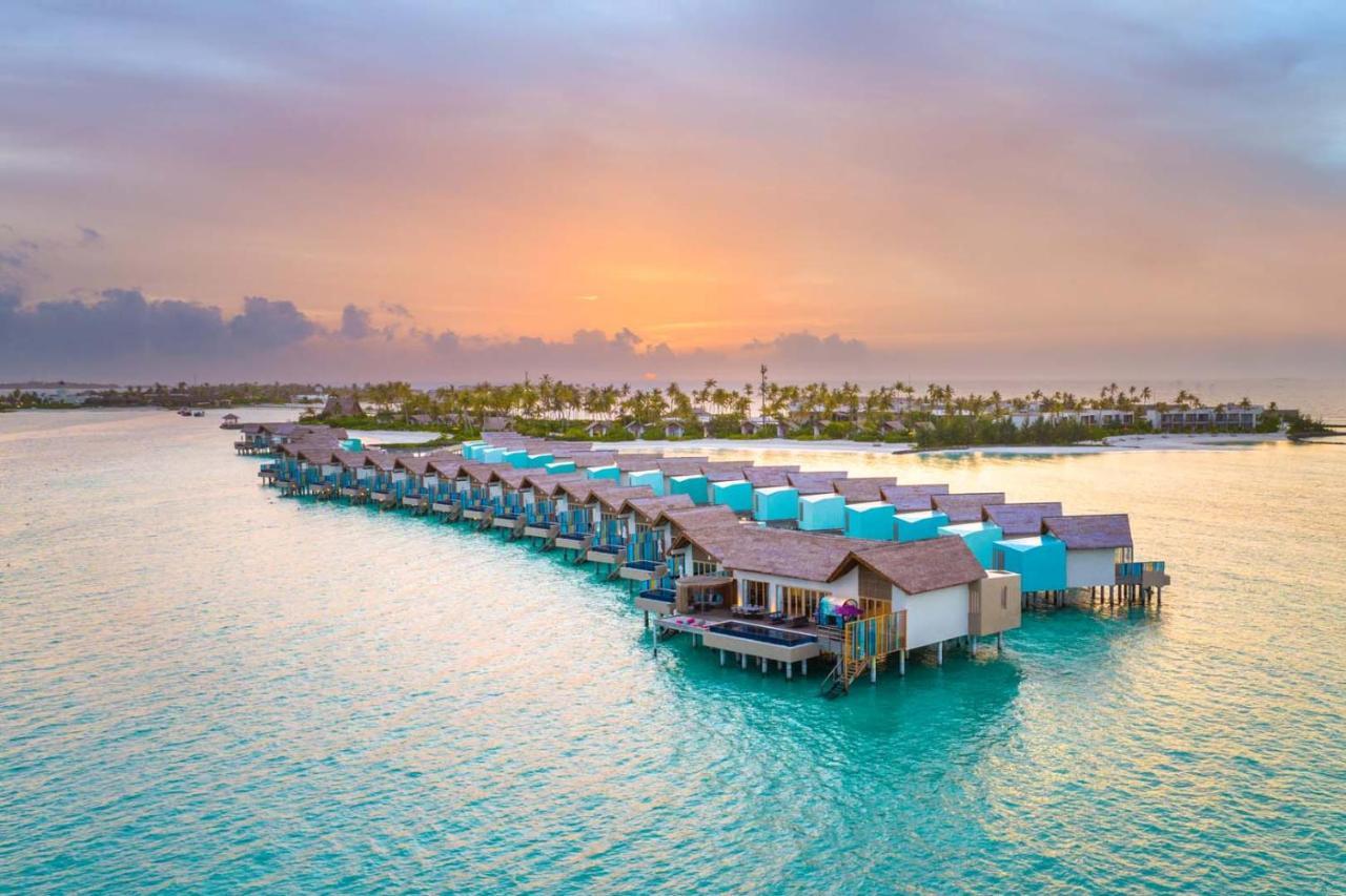 Hard Rock Hotel Maldives Emboodhoo Lagoon Exterior foto Sunset at the resort